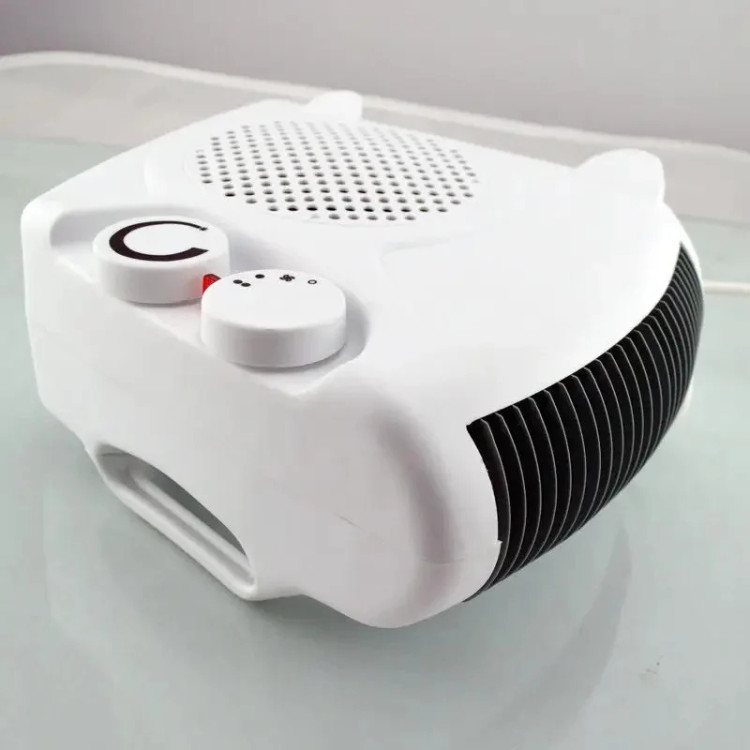 بخاری برقی فندار وارمتی مدل LQ-901 با توان 2000 وات و ترموستات قابل تنظیم و سیستم قطع خودکار Warmty electric fan heater model LQ-901 with 2000 watts of power, adjustable thermostat and automatic shut-off system