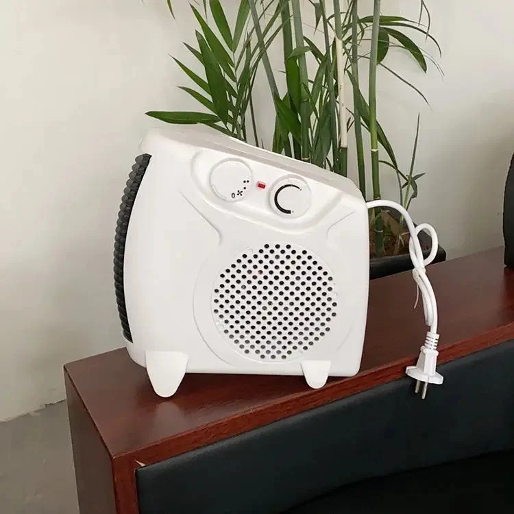 بخاری برقی فندار وارمتی مدل LQ-901 با توان 2000 وات و ترموستات قابل تنظیم و سیستم قطع خودکار Warmty electric fan heater model LQ-901 with 2000 watts of power, adjustable thermostat and automatic shut-off system