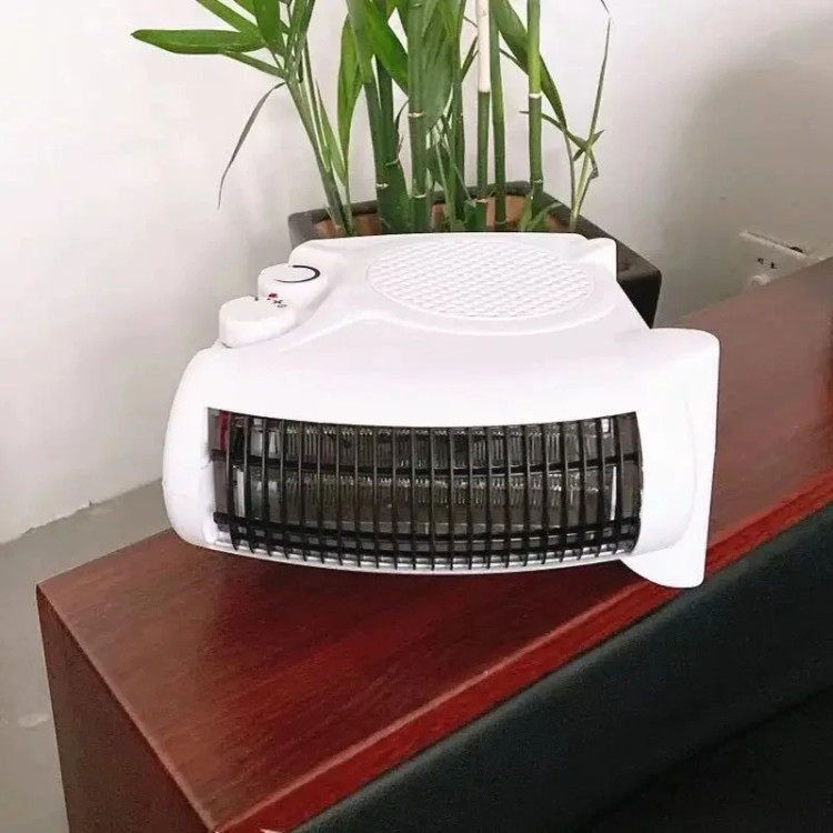 بخاری برقی فندار وارمتی مدل LQ-901 با توان 2000 وات و ترموستات قابل تنظیم و سیستم قطع خودکار Warmty electric fan heater model LQ-901 with 2000 watts of power, adjustable thermostat and automatic shut-off system