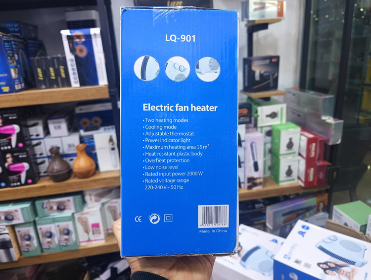 بخاری برقی فندار وارمتی مدل LQ-901 با توان 2000 وات و ترموستات قابل تنظیم و سیستم قطع خودکار Warmty electric fan heater model LQ-901 with 2000 watts of power, adjustable thermostat and automatic shut-off system