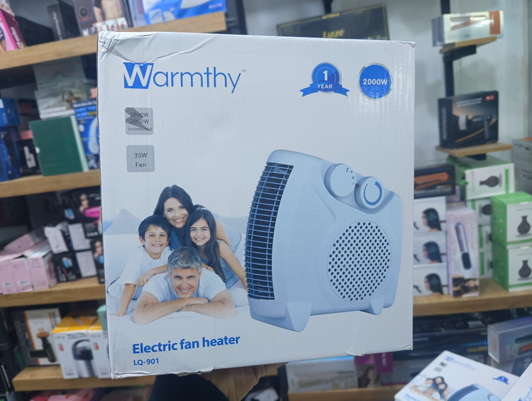 بخاری برقی فندار وارمتی مدل LQ-901 با توان 2000 وات و ترموستات قابل تنظیم و سیستم قطع خودکار Warmty electric fan heater model LQ-901 with 2000 watts of power, adjustable thermostat and automatic shut-off system