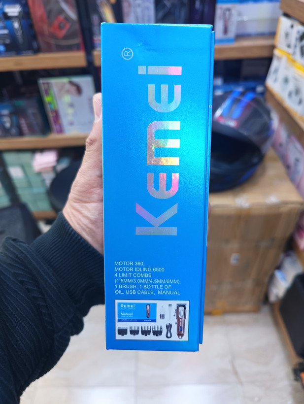 ماشین اصلاح مو و ریش کیمی مدل Kemei KM-233 با نمایشگر LCD و شارژ USB Kemei KM-233 hair and beard trimmer with LCD display and USB charging