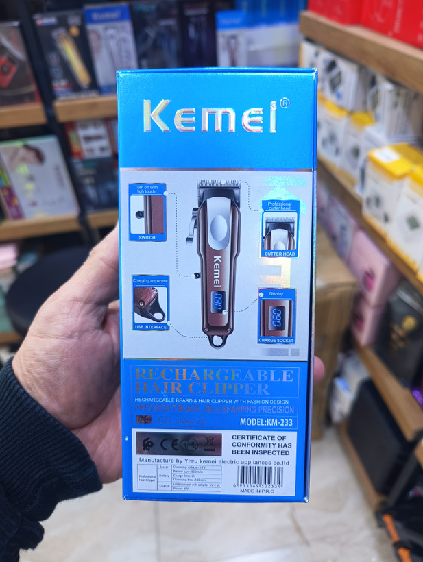 ماشین اصلاح مو و ریش کیمی مدل Kemei KM-233 با نمایشگر LCD و شارژ USB Kemei KM-233 hair and beard trimmer with LCD display and USB charging